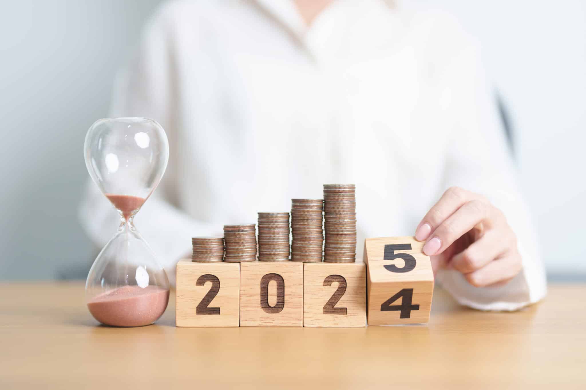 As the year shifts from 2023 to 2024, with stacked coins on blocks and an hourglass on the table, a Los Angeles employment attorney skillfully navigates new opportunities, ensuring a seamless transition into the future. Employee Rights>Workplace Discrimination